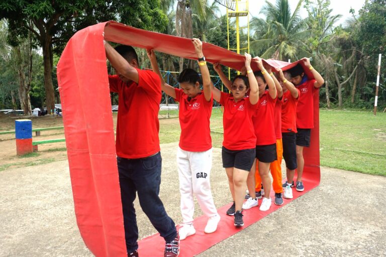 Red Team slaying the Human Caterpillar challenge during our team building adventure!