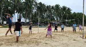 During their El Nido excursion, a few individuals engaged in a game of beach volleyball.